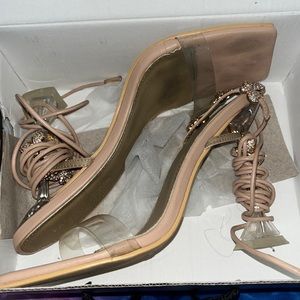 Rose gold, size 7.5, slightly worn